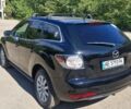Черный Мазда СХ-7, объемом двигателя 2.5 л и пробегом 249 тыс. км за 8700 $, фото 1 на Automoto.ua