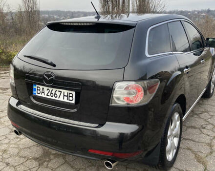 Чорний Мазда СХ-7, об'ємом двигуна 2.3 л та пробігом 113 тис. км за 11000 $, фото 6 на Automoto.ua