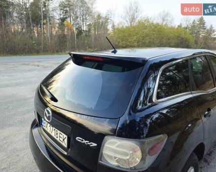Черный Мазда СХ-7, объемом двигателя 2.5 л и пробегом 190 тыс. км за 12000 $, фото 2 на Automoto.ua
