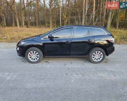 Черный Мазда СХ-7, объемом двигателя 2.5 л и пробегом 190 тыс. км за 12000 $, фото 20 на Automoto.ua