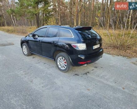 Черный Мазда СХ-7, объемом двигателя 2.5 л и пробегом 190 тыс. км за 12000 $, фото 19 на Automoto.ua