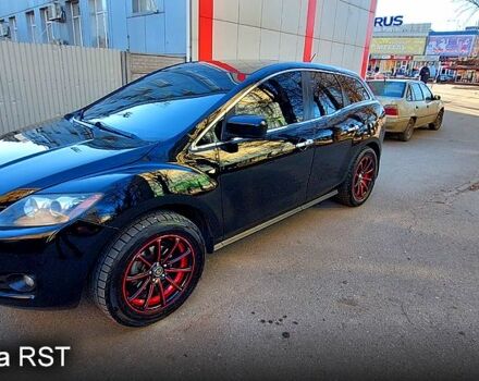 Черный Мазда СХ-7, объемом двигателя 2.3 л и пробегом 300 тыс. км за 6500 $, фото 1 на Automoto.ua