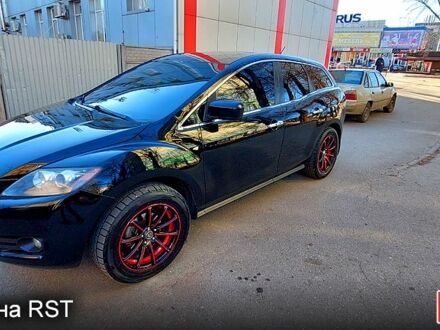 Черный Мазда СХ-7, объемом двигателя 2.3 л и пробегом 300 тыс. км за 6500 $, фото 1 на Automoto.ua
