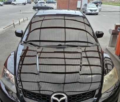 Черный Мазда СХ-7, объемом двигателя 2.3 л и пробегом 225 тыс. км за 5500 $, фото 1 на Automoto.ua