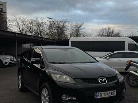 Черный Мазда СХ-7, объемом двигателя 2.26 л и пробегом 255 тыс. км за 6900 $, фото 1 на Automoto.ua