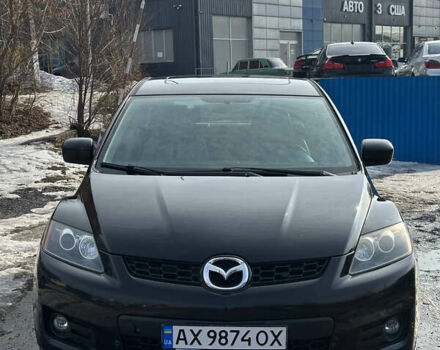 Черный Мазда СХ-7, объемом двигателя 2.26 л и пробегом 210 тыс. км за 6500 $, фото 1 на Automoto.ua