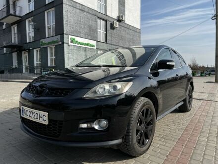 Черный Мазда СХ-7, объемом двигателя 2.3 л и пробегом 220 тыс. км за 7000 $, фото 1 на Automoto.ua