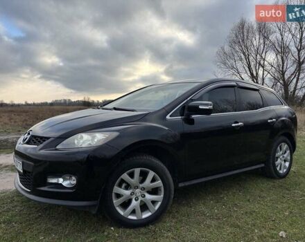 Черный Мазда СХ-7, объемом двигателя 2.26 л и пробегом 220 тыс. км за 7950 $, фото 1 на Automoto.ua