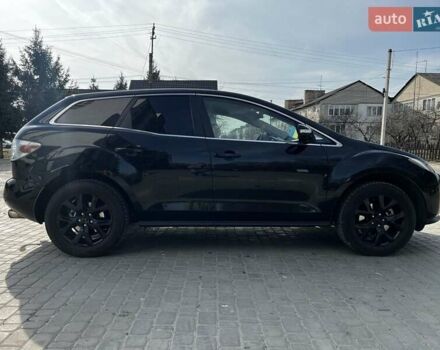 Черный Мазда СХ-7, объемом двигателя 2.3 л и пробегом 220 тыс. км за 7000 $, фото 1 на Automoto.ua