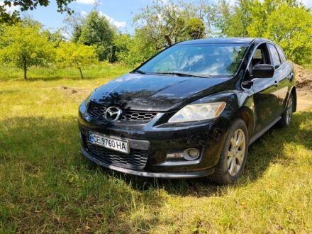 Черный Мазда СХ-7, объемом двигателя 2.3 л и пробегом 130 тыс. км за 3400 $, фото 1 на Automoto.ua