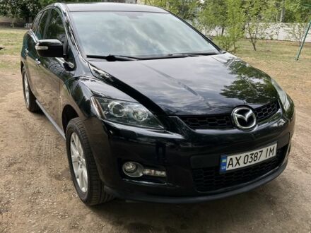 Черный Мазда СХ-7, объемом двигателя 2.3 л и пробегом 130 тыс. км за 7100 $, фото 1 на Automoto.ua