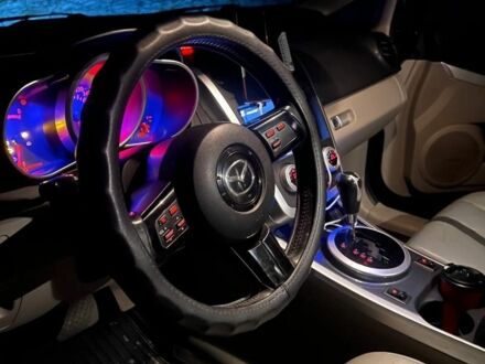 Черный Мазда СХ-7, объемом двигателя 2.3 л и пробегом 153 тыс. км за 7000 $, фото 1 на Automoto.ua