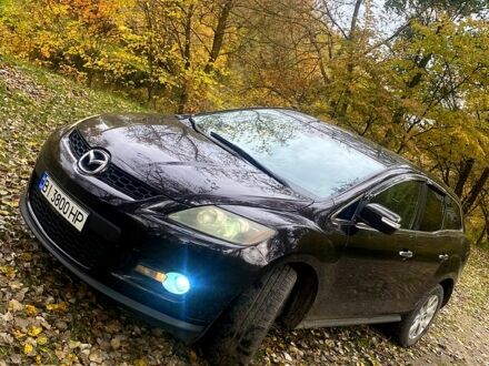 Черный Мазда СХ-7, объемом двигателя 2.3 л и пробегом 227 тыс. км за 7500 $, фото 1 на Automoto.ua