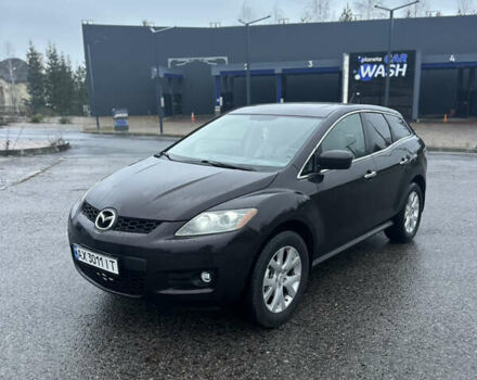 Черный Мазда СХ-7, объемом двигателя 2.26 л и пробегом 133 тыс. км за 7500 $, фото 1 на Automoto.ua