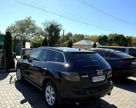 Чорний Мазда СХ-7, об'ємом двигуна 2.3 л та пробігом 288 тис. км за 8500 $, фото 1 на Automoto.ua