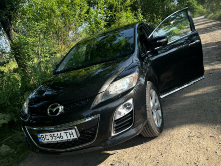 Черный Мазда СХ-7, объемом двигателя 2.2 л и пробегом 280 тыс. км за 7000 $, фото 1 на Automoto.ua