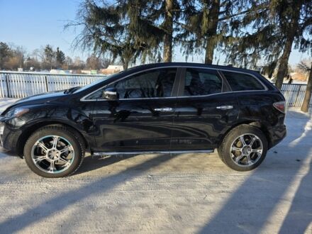 Черный Мазда СХ-7, объемом двигателя 2.2 л и пробегом 235 тыс. км за 10300 $, фото 1 на Automoto.ua