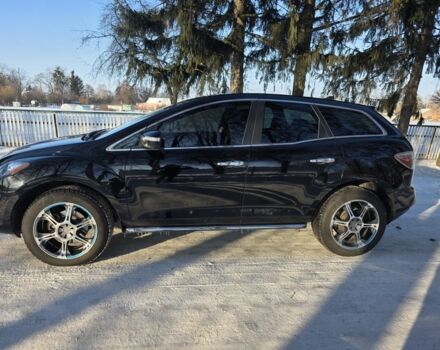 Черный Мазда СХ-7, объемом двигателя 2.2 л и пробегом 235 тыс. км за 10300 $, фото 1 на Automoto.ua