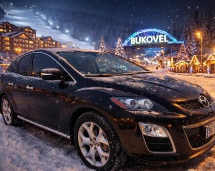 Черный Мазда СХ-7, объемом двигателя 2.3 л и пробегом 185 тыс. км за 9650 $, фото 1 на Automoto.ua