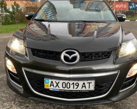 Черный Мазда СХ-7, объемом двигателя 2.26 л и пробегом 144 тыс. км за 9500 $, фото 1 на Automoto.ua