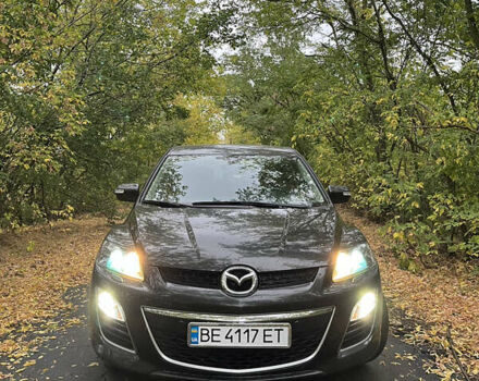 Черный Мазда СХ-7, объемом двигателя 2.2 л и пробегом 240 тыс. км за 10000 $, фото 1 на Automoto.ua
