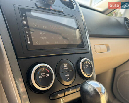 Фиолетовый Мазда СХ-7, объемом двигателя 2.5 л и пробегом 320 тыс. км за 11500 $, фото 16 на Automoto.ua