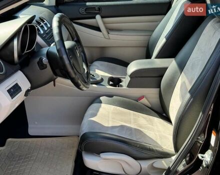 Фиолетовый Мазда СХ-7, объемом двигателя 2.5 л и пробегом 249 тыс. км за 9990 $, фото 17 на Automoto.ua