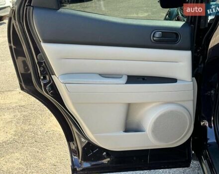 Фиолетовый Мазда СХ-7, объемом двигателя 2.5 л и пробегом 249 тыс. км за 9990 $, фото 20 на Automoto.ua