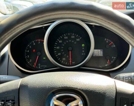 Фиолетовый Мазда СХ-7, объемом двигателя 2.5 л и пробегом 249 тыс. км за 9990 $, фото 29 на Automoto.ua