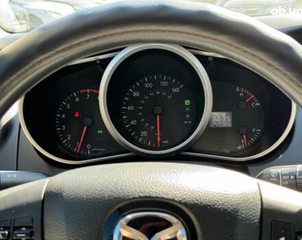 Мазда СХ-7 2011 в Виннице на Automoto.ua Фиолетовый Мазда СХ-7, объемом двигателя 2.5 л и пробегом 249 тыс. км за 9990 $, фото 29 на Automoto.ua