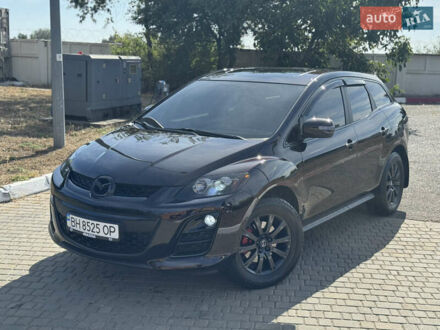 Фиолетовый Мазда СХ-7, объемом двигателя 2.5 л и пробегом 320 тыс. км за 11500 $, фото 1 на Automoto.ua