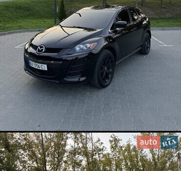 Фиолетовый Мазда СХ-7, объемом двигателя 2.5 л и пробегом 160 тыс. км за 12000 $, фото 1 на Automoto.ua