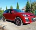 Красный Мазда СХ-7, объемом двигателя 2.2 л и пробегом 179 тыс. км за 8990 $, фото 1 на Automoto.ua
