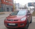 Красный Мазда СХ-7, объемом двигателя 2.3 л и пробегом 145 тыс. км за 6700 $, фото 1 на Automoto.ua
