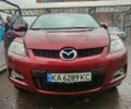 Красный Мазда СХ-7, объемом двигателя 2.3 л и пробегом 203 тыс. км за 5499 $, фото 1 на Automoto.ua