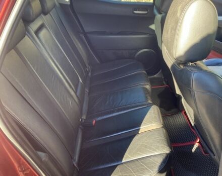 Красный Мазда СХ-7, объемом двигателя 2.3 л и пробегом 176 тыс. км за 6800 $, фото 5 на Automoto.ua