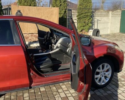 Красный Мазда СХ-7, объемом двигателя 2.3 л и пробегом 176 тыс. км за 6800 $, фото 3 на Automoto.ua