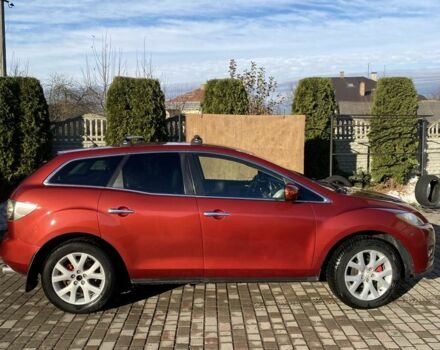 Красный Мазда СХ-7, объемом двигателя 2.3 л и пробегом 176 тыс. км за 6800 $, фото 1 на Automoto.ua