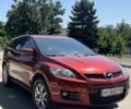 Красный Мазда СХ-7, объемом двигателя 2.3 л и пробегом 174 тыс. км за 6300 $, фото 1 на Automoto.ua