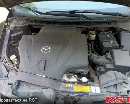 Красный Мазда СХ-7, объемом двигателя 2.3 л и пробегом 95 тыс. км за 6300 $, фото 4 на Automoto.ua