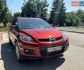 Червоний Мазда СХ-7, об'ємом двигуна 2.3 л та пробігом 174 тис. км за 6300 $, фото 9 на Automoto.ua