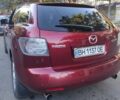 Красный Мазда СХ-7, объемом двигателя 2.3 л и пробегом 300 тыс. км за 7000 $, фото 5 на Automoto.ua