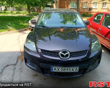 Красный Мазда СХ-7, объемом двигателя 2.3 л и пробегом 95 тыс. км за 6300 $, фото 1 на Automoto.ua