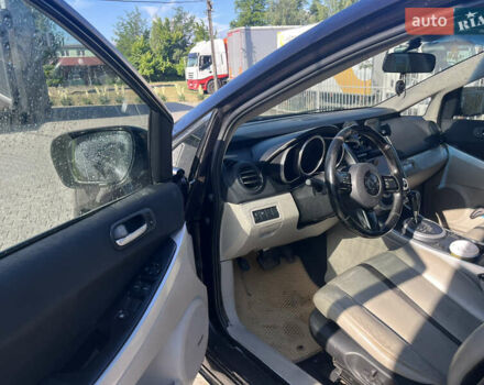 Красный Мазда СХ-7, объемом двигателя 2.26 л и пробегом 155 тыс. км за 6300 $, фото 1 на Automoto.ua