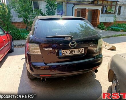 Красный Мазда СХ-7, объемом двигателя 2.3 л и пробегом 95 тыс. км за 6300 $, фото 5 на Automoto.ua