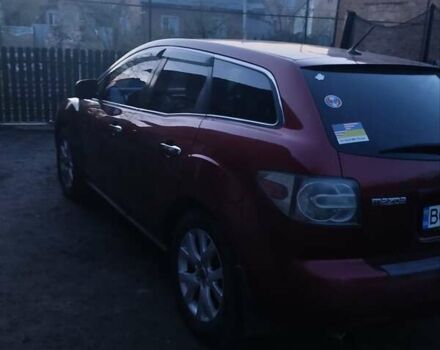 Красный Мазда СХ-7, объемом двигателя 2.26 л и пробегом 130 тыс. км за 6000 $, фото 1 на Automoto.ua