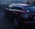 Красный Мазда СХ-7, объемом двигателя 2.26 л и пробегом 130 тыс. км за 6000 $, фото 1 на Automoto.ua