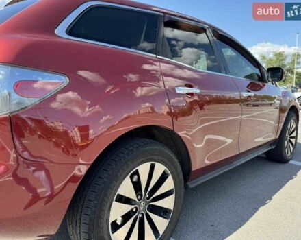 Червоний Мазда СХ-7, об'ємом двигуна 2.3 л та пробігом 180 тис. км за 7000 $, фото 6 на Automoto.ua