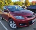 Красный Мазда СХ-7, объемом двигателя 2.3 л и пробегом 300 тыс. км за 7000 $, фото 1 на Automoto.ua