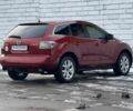 Красный Мазда СХ-7, объемом двигателя 2.3 л и пробегом 190 тыс. км за 6500 $, фото 5 на Automoto.ua